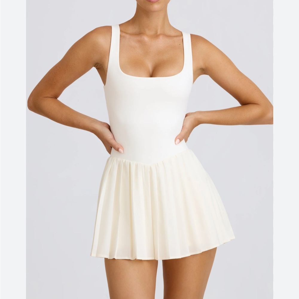 Soft Active Open-Back Pleated Tennis Dress in White from Bo & Tee